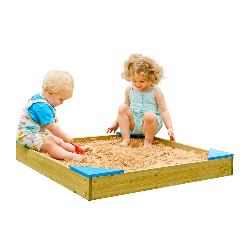 Deux enfantsjouent dans le bac à sable.