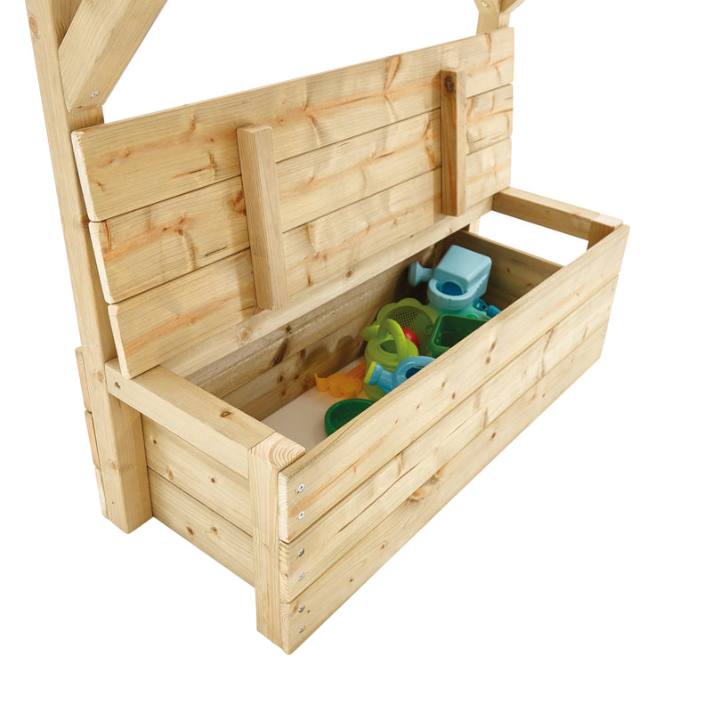 Coffre de rangement pour enfant avec le couvercle ouvert, montrant l’espace intérieur.