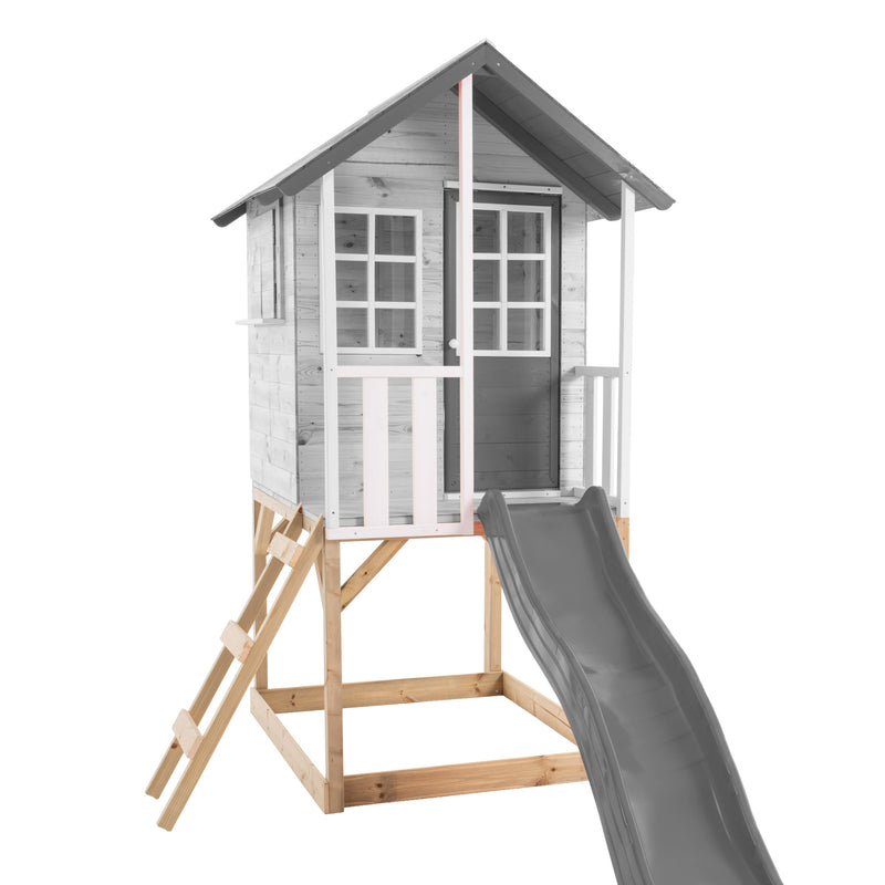 Plateforme surélevée en bois pour maisonnette modulable enfant, avec échelle d’accès et toboggan, maisonnette grisée à titre d’exemple.